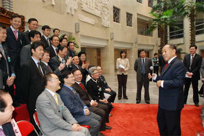 李肇星会见列席全国政协十届五次会议的海外侨胞