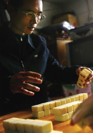 麻将高手退出江湖隐于市 有"旋风杠"绝技(图)