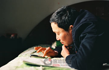 图片故事:为儿买房