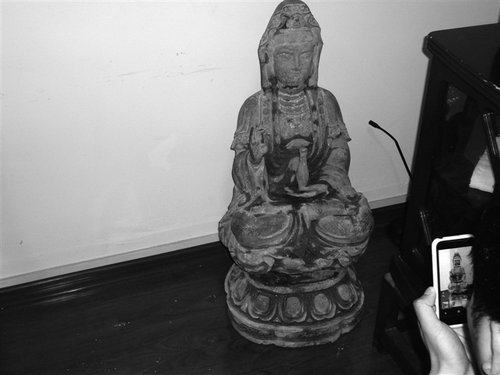 河道采砂采到尊铜观音像 背部有“乾隆年制”字样