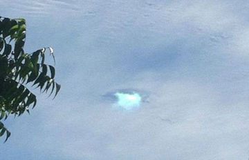 美加州上空云层现神秘空洞 引发外星生物猜测