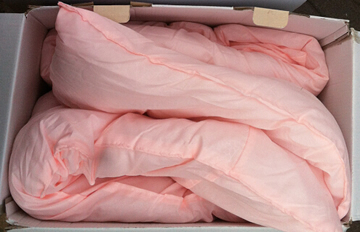 超市购酒中了蚕丝被 打开却布满体毛有脚臭味