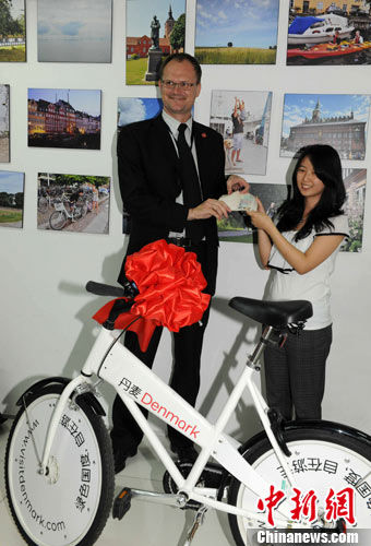 丹麦签证中心成功运营申请者获赠世博自行车_