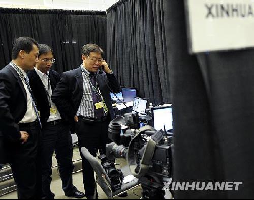 新华社首次实现海外卫星电视直播报道[组图],卫