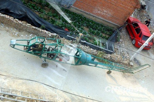 组图:山东郯城农民第九次试飞自制直升机图片