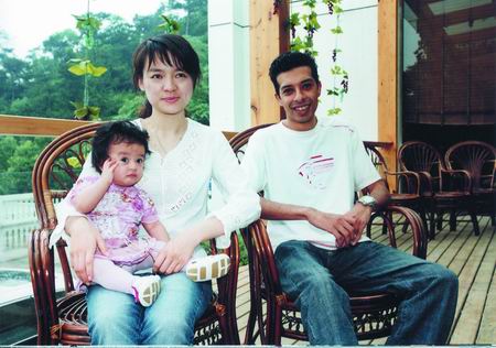 诸宸希望女儿胖一点 将留女儿在国内"增肥(图)