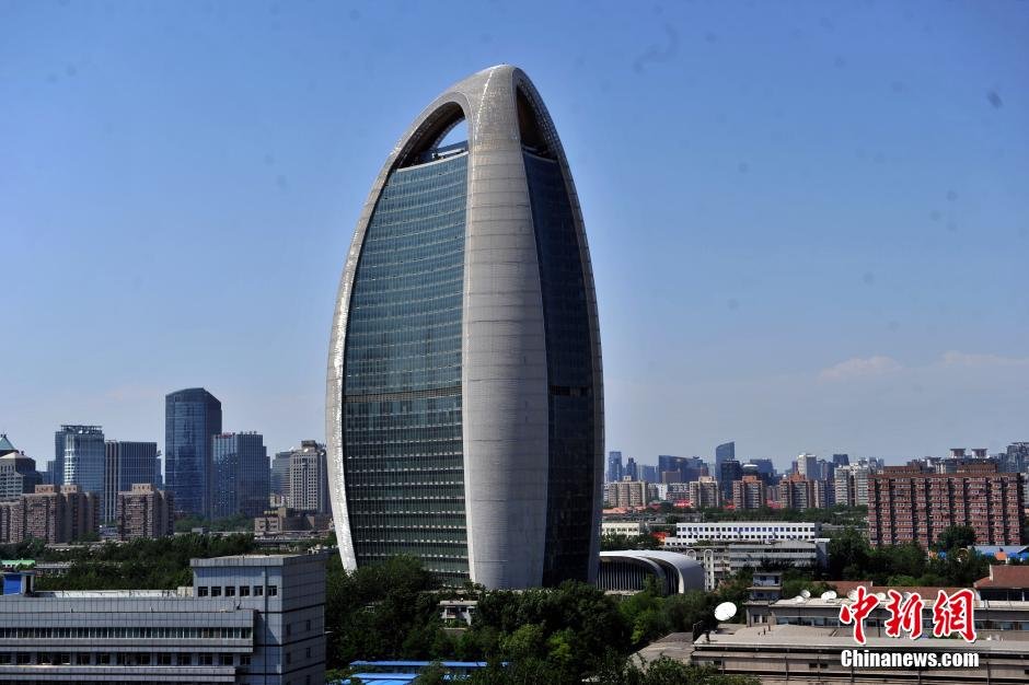 组图人民日报新大楼脱去土豪金外衣